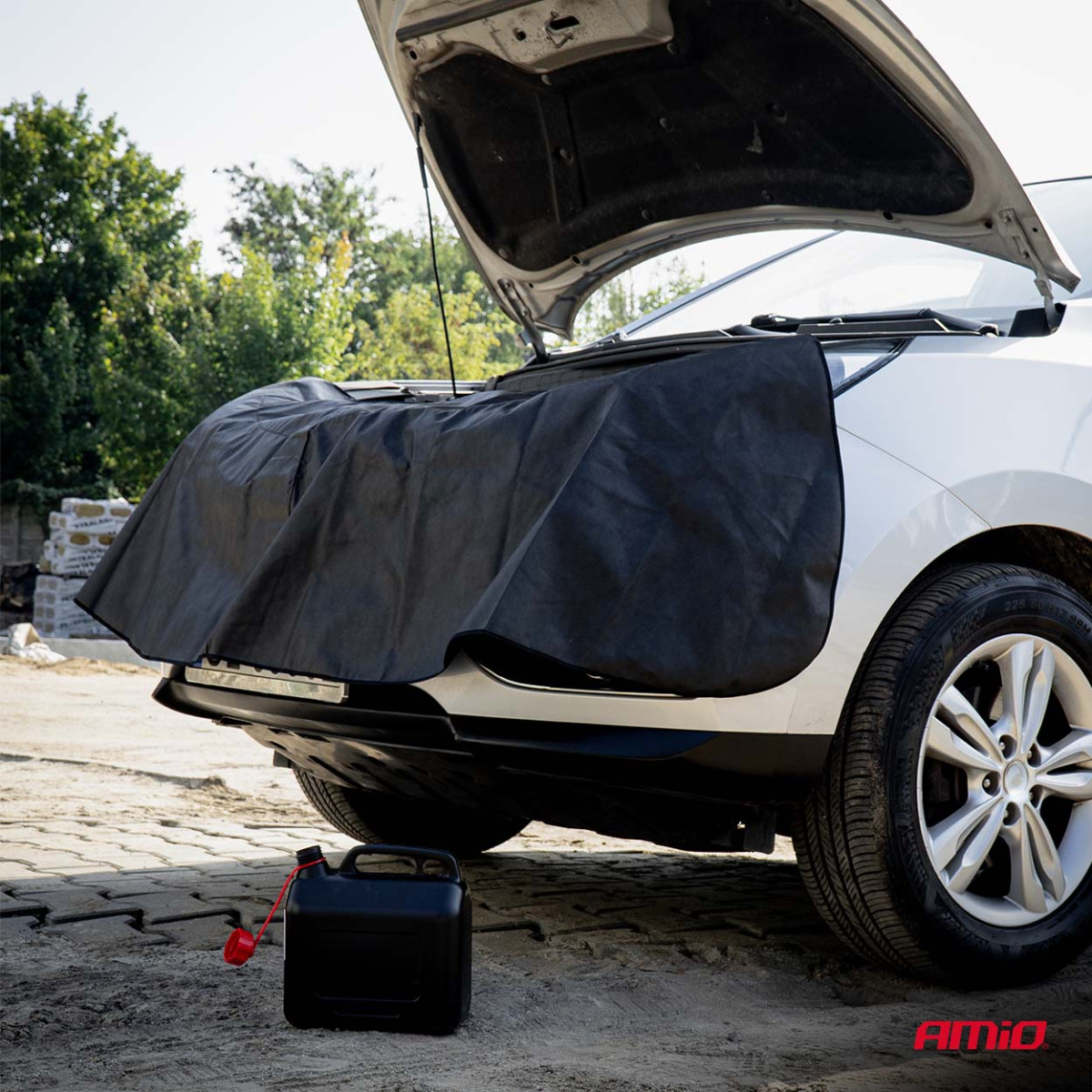 Skyddande servicekåpa för bilens framsida