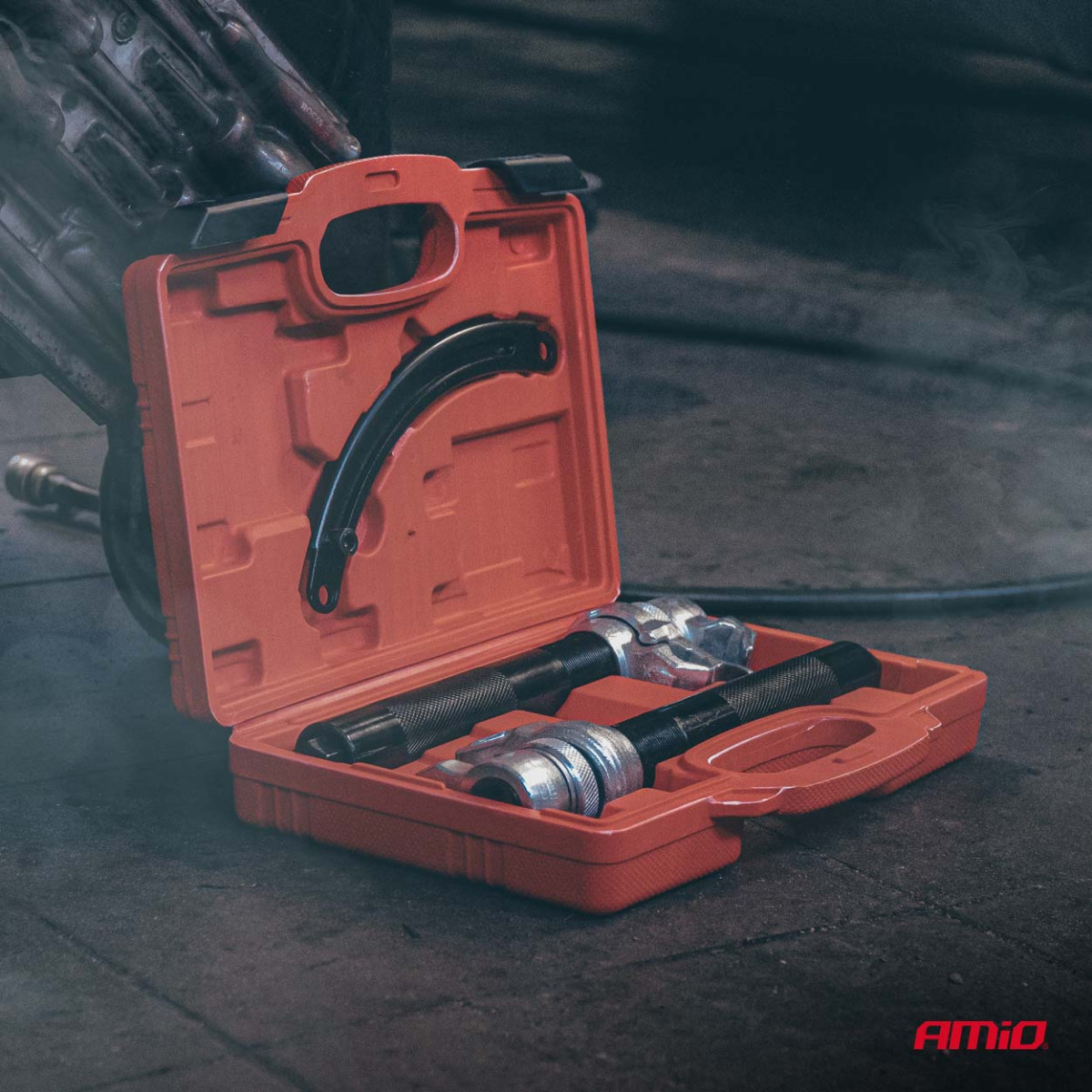 Fjäderkompressorset med säkerhetsfäste AMIO-04763